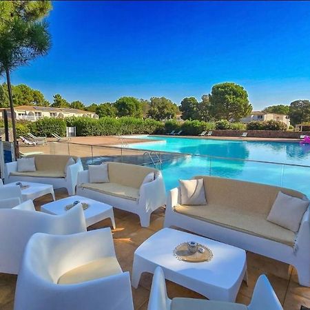 Fiori Di Cala Rossa Residence Hoteliere Lecci Exterior photo