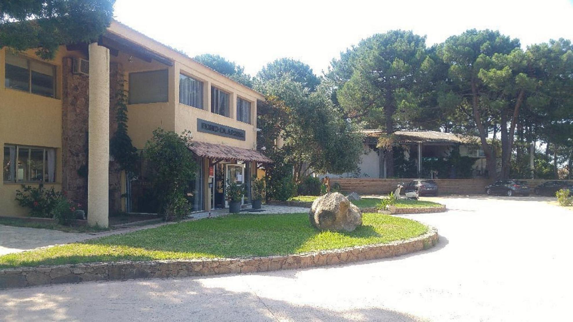 Fiori Di Cala Rossa Residence Hoteliere Lecci Exterior photo