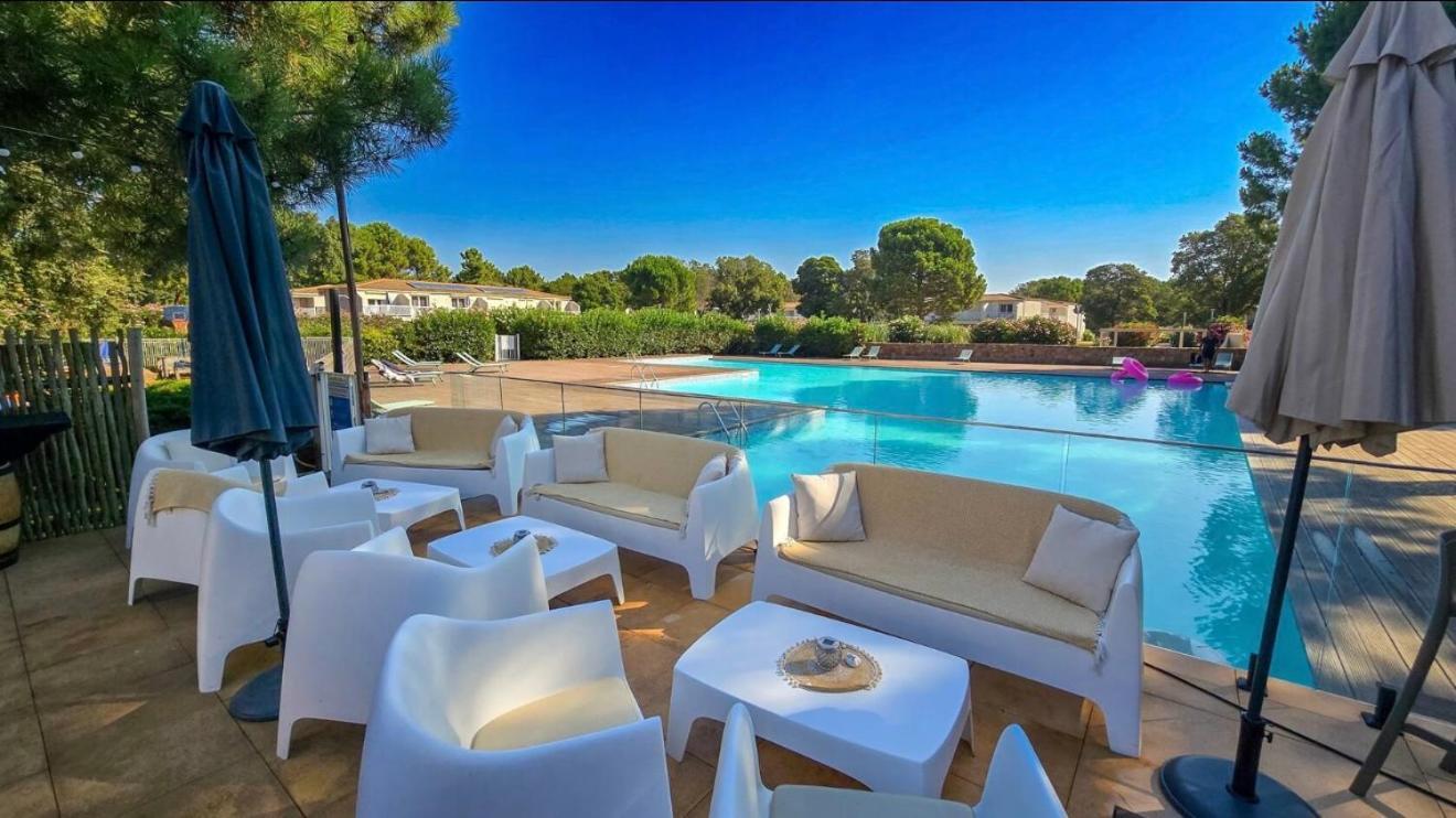 Fiori Di Cala Rossa Residence Hoteliere Lecci Exterior photo